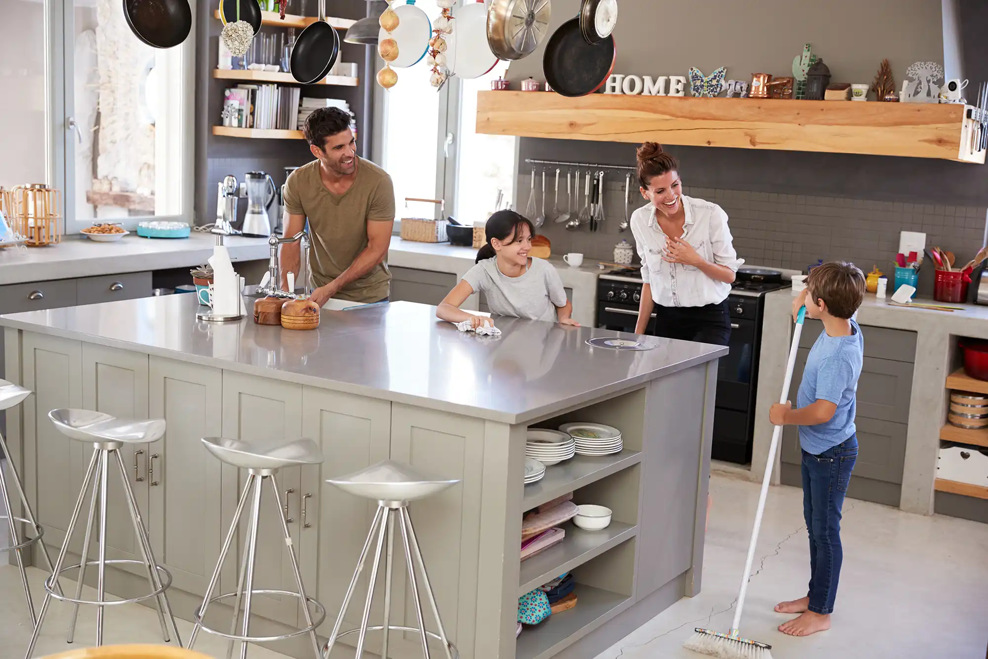 Family enjoying new kitchen in their home extension